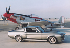 This is Eleanor, from Gone In 60 Seconds (2000), posed with Ridge Runner, a P-51 Mustang Fighter